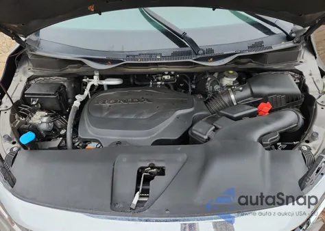 2022 Honda Odyssey Touring from USA, damaged, VIN 5FNRL6H82NB037300